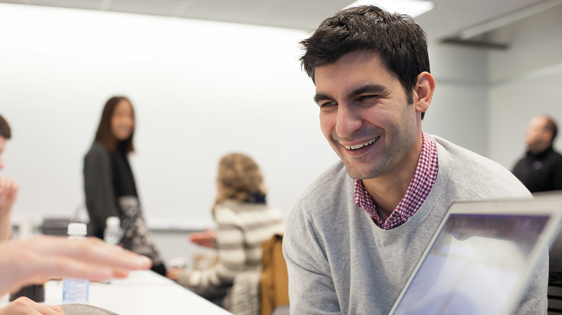 Smiling graduate student