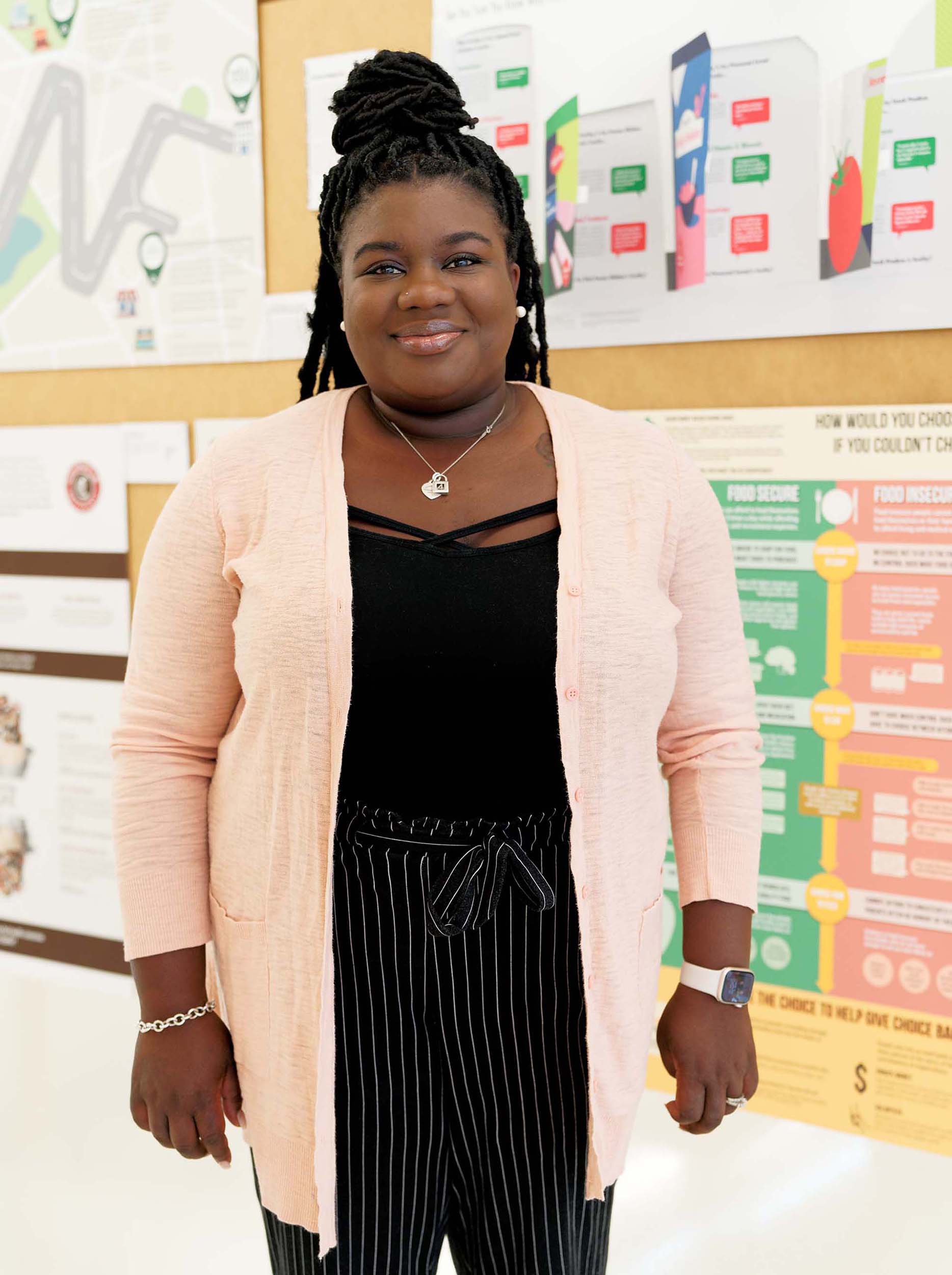 Mariah Jamison, stands in an ID studio
