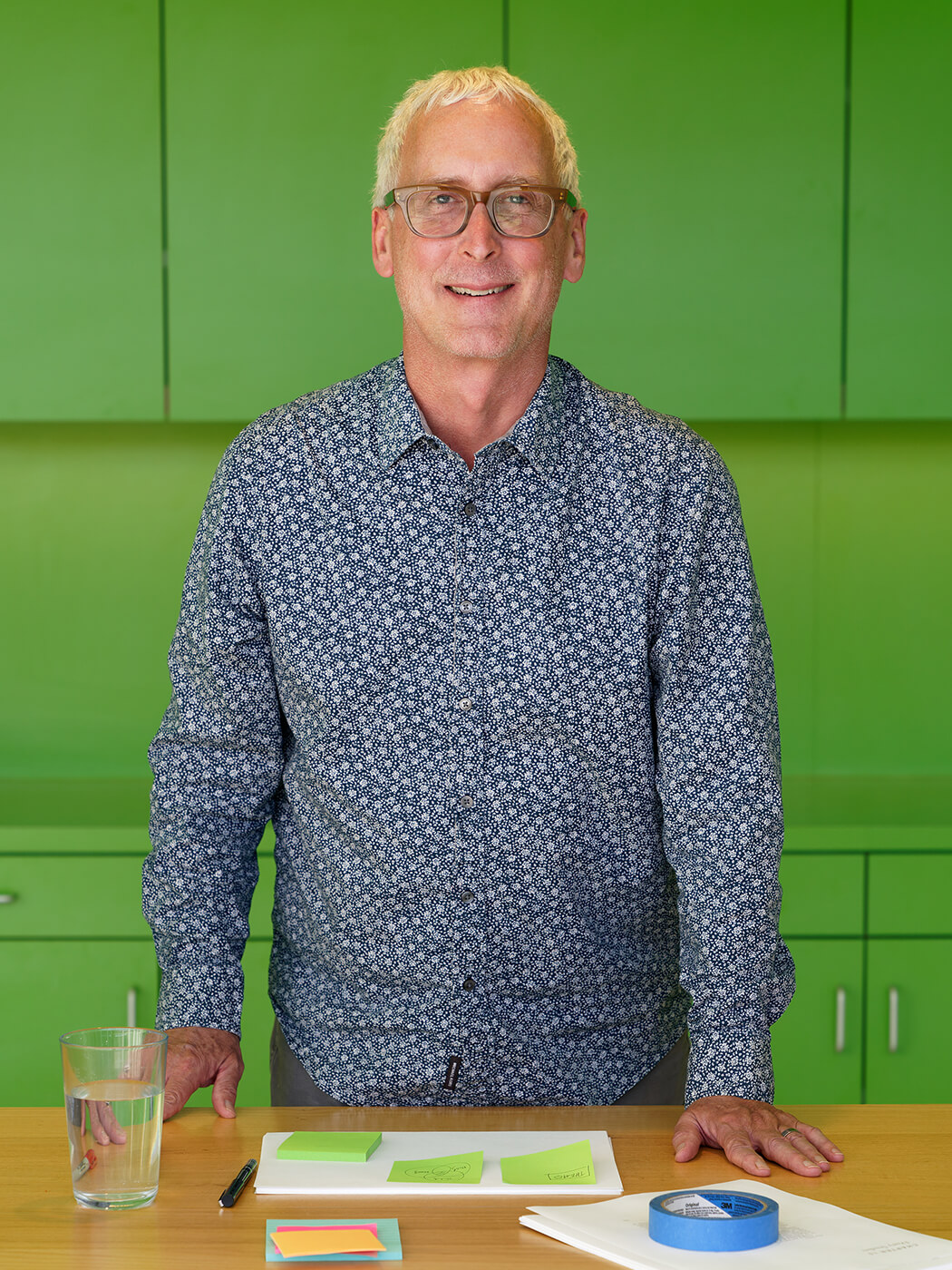 Mark Jones standing at a desk