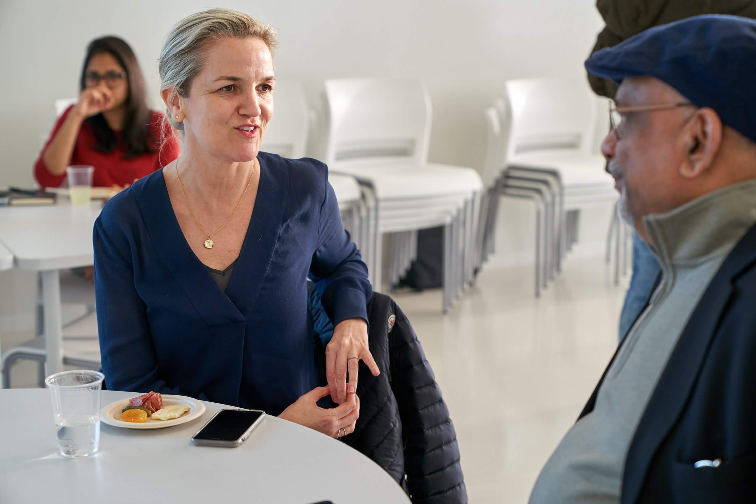 Alumni Kathleen Brandenburg and Vijay Kumar at Fernando Franco talk