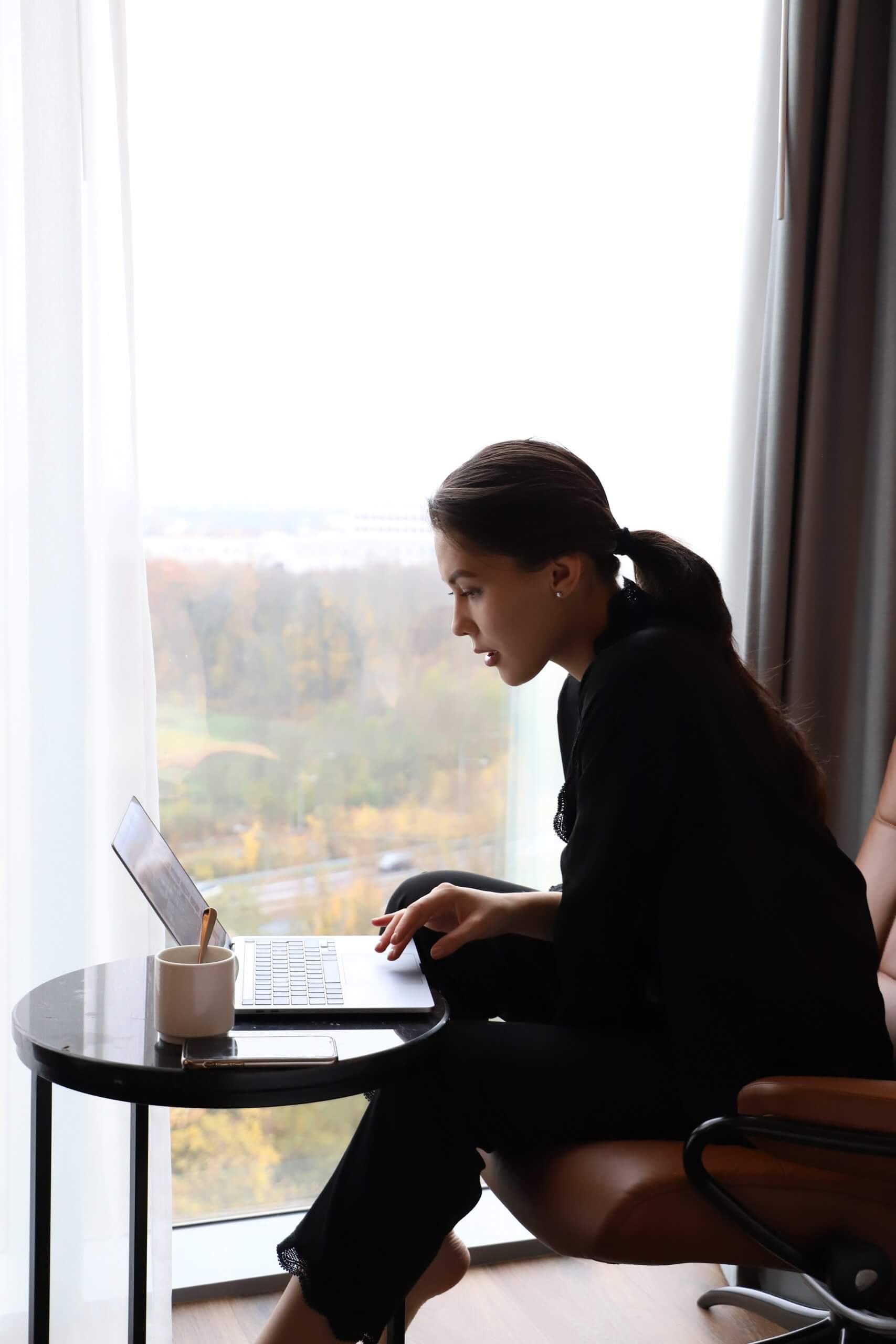 Woman conducting interview online.