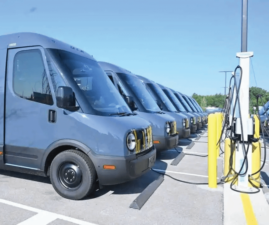 Vehicles charging at an outdoor parking lot